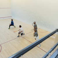 Students playing squash thumbnail